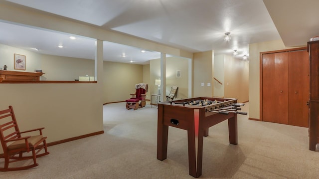 playroom featuring light colored carpet