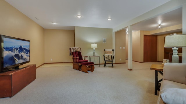 sitting room with light colored carpet