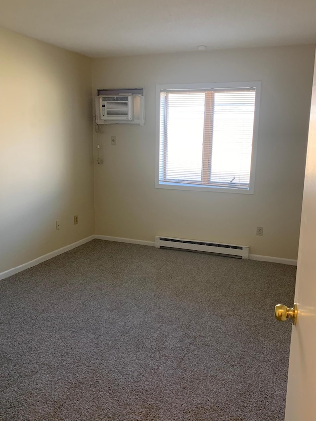 carpeted empty room with baseboards, a baseboard radiator, and a wall unit AC