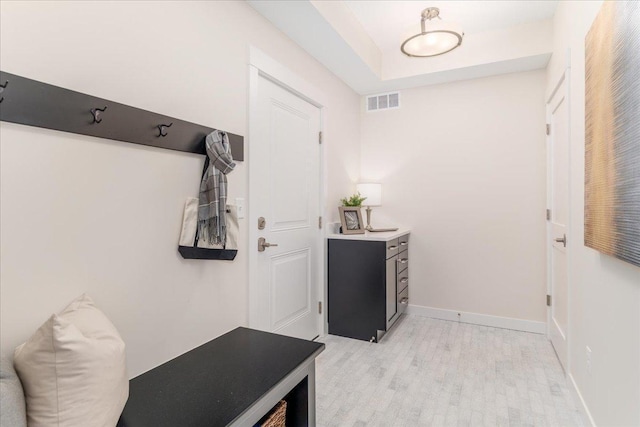 mudroom with light wood-type flooring