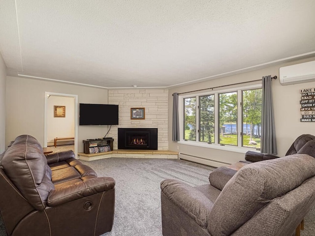 living area with a baseboard heating unit, a wall mounted air conditioner, carpet flooring, a fireplace, and a textured ceiling
