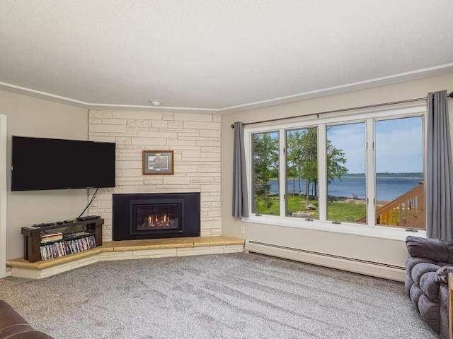 carpeted living room featuring a water view, a stone fireplace, and a baseboard radiator