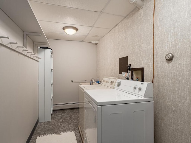 laundry room with independent washer and dryer and baseboard heating