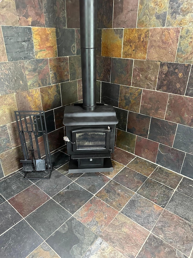 interior details featuring a wood stove