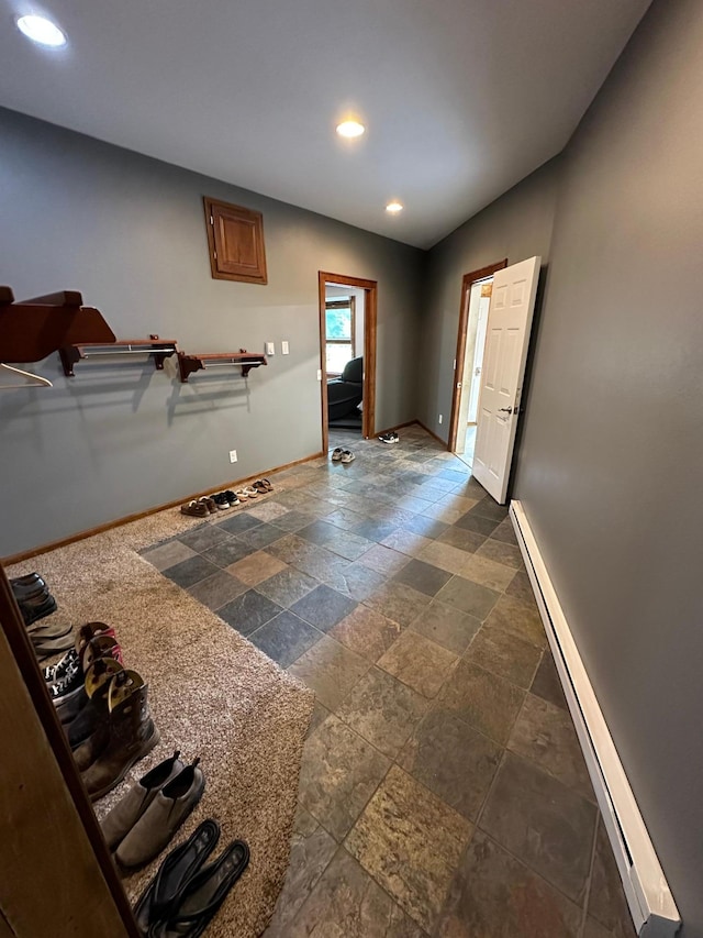 entrance foyer with a baseboard heating unit