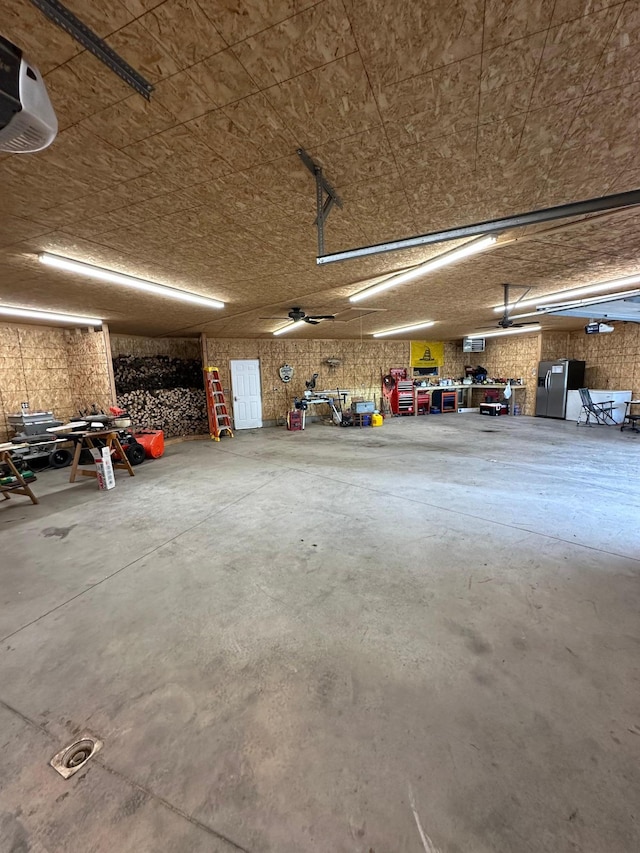 921 11th St N, Mountain Lake, MN 56159 - garage featuring a workshop area