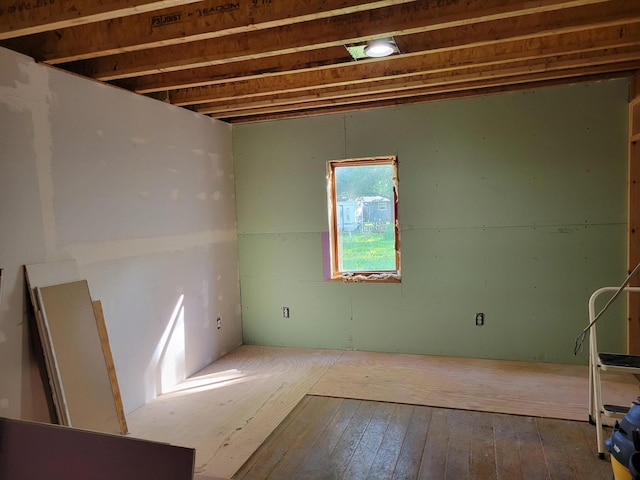 unfurnished room featuring hardwood / wood-style floors