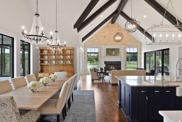 dining space with beam ceiling, high vaulted ceiling, a wealth of natural light, and dark wood-type flooring