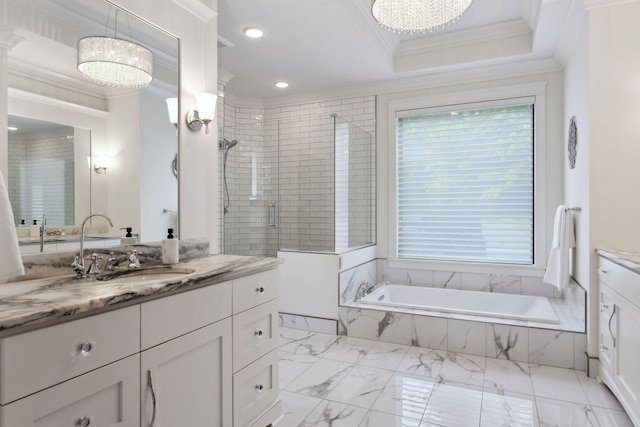 bathroom with crown molding, vanity, shower with separate bathtub, and an inviting chandelier