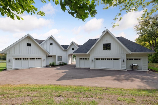 modern farmhouse style home with a garage