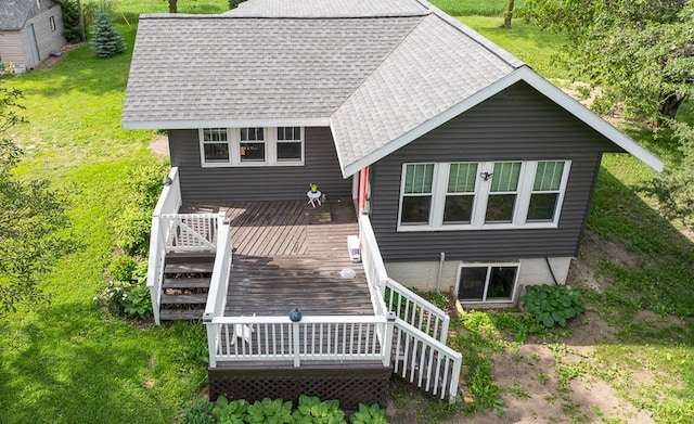 back of property featuring a deck