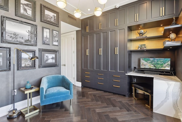 sitting room with dark parquet flooring