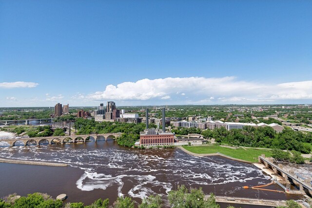 birds eye view of property featuring a water view