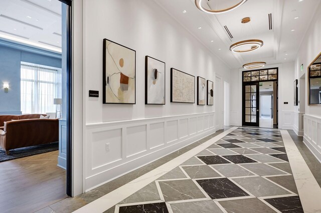 hallway with french doors and dark hardwood / wood-style floors