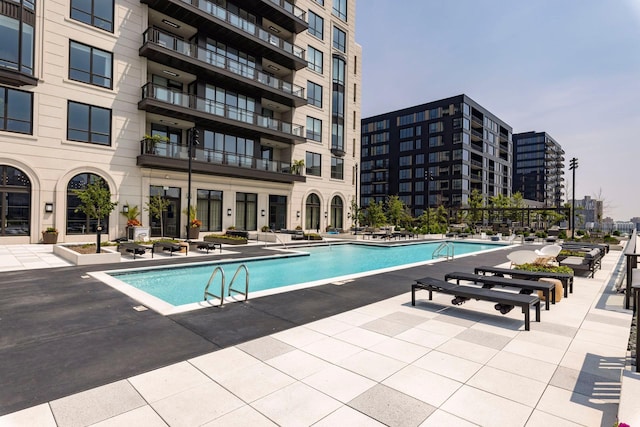 view of pool with a patio area