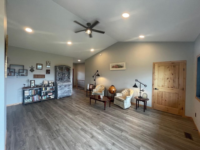 sitting room with wood-type flooring, ceiling fan, and lofted ceiling