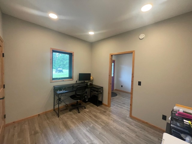 office area with light hardwood / wood-style flooring