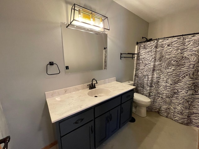 bathroom with vanity, toilet, and curtained shower