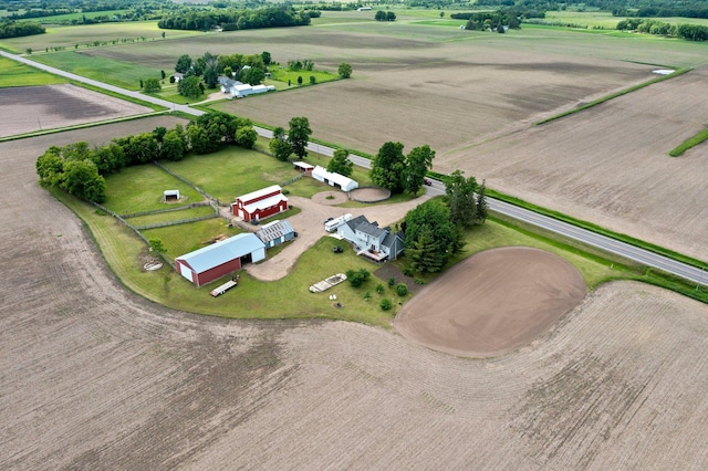 birds eye view of property featuring a rural view