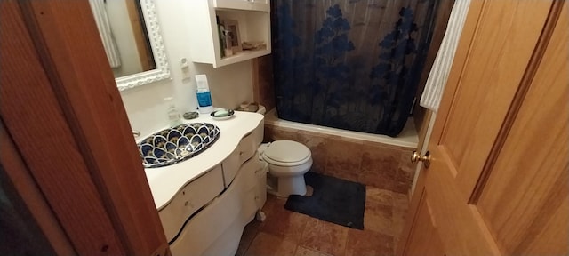 full bathroom with tile patterned flooring, vanity, toilet, and shower / bath combo