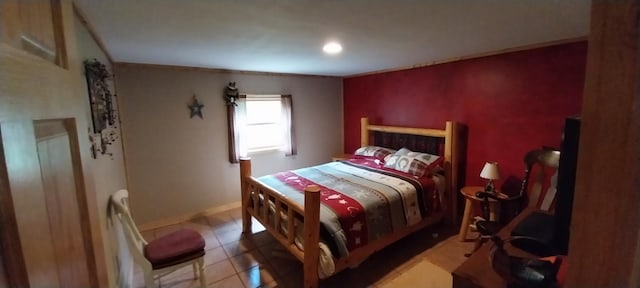 bedroom featuring light tile patterned floors