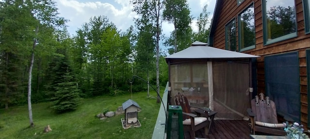 exterior space with a yard and a gazebo