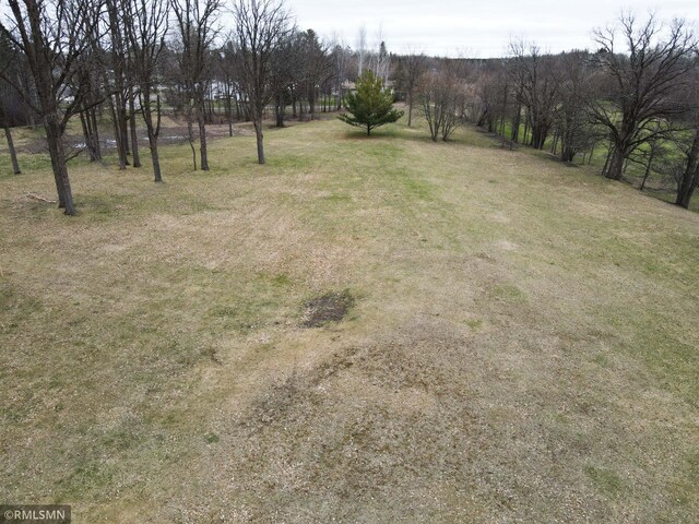 view of yard with a rural view