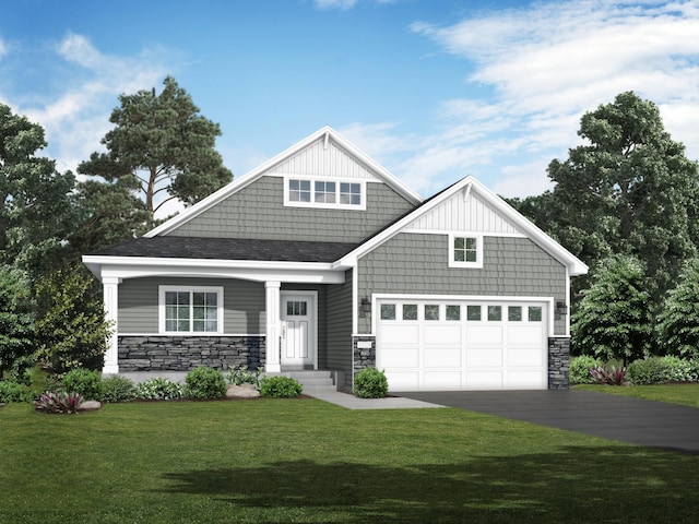 craftsman-style house with a garage and a front lawn