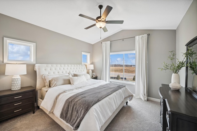 bedroom with light carpet, vaulted ceiling, and ceiling fan