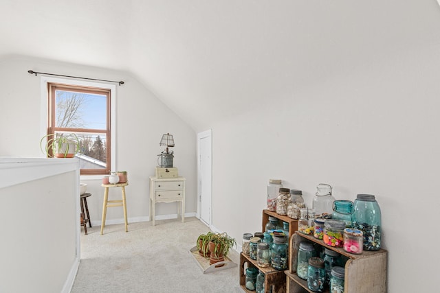 playroom with lofted ceiling, carpet, and baseboards