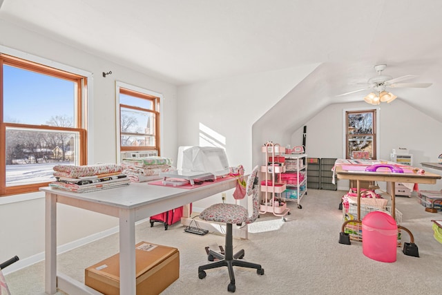 recreation room featuring carpet and vaulted ceiling