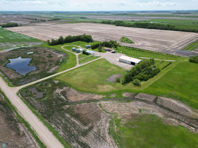 bird's eye view featuring a water view and a rural view