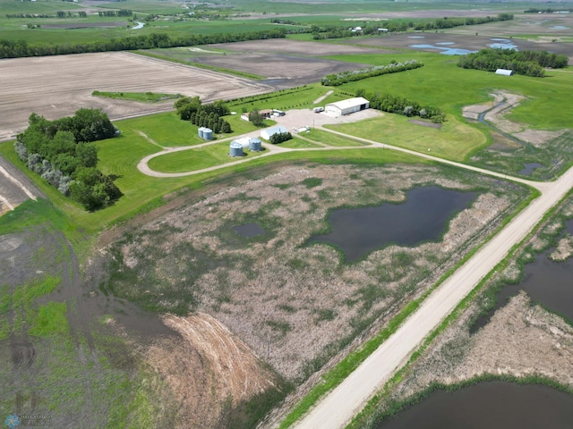 bird's eye view with a rural view and a water view