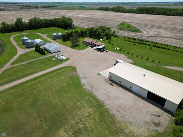 birds eye view of property featuring a rural view
