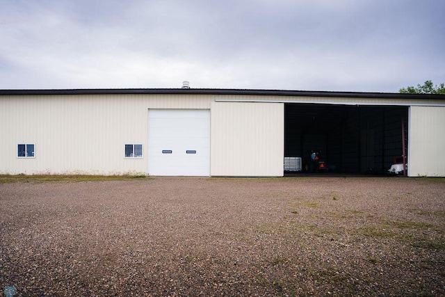 view of outdoor structure with a garage