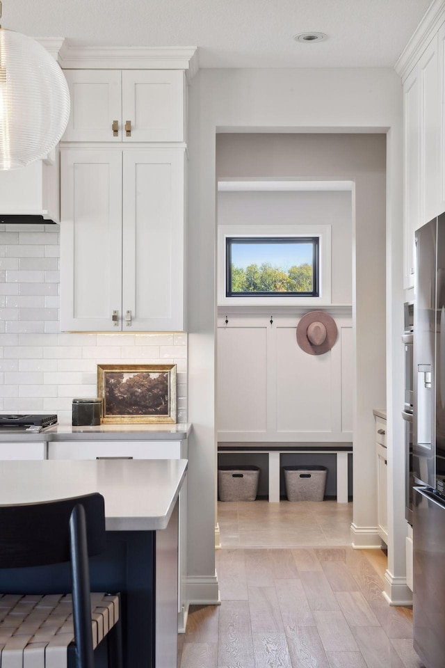 mudroom featuring light hardwood / wood-style flooring