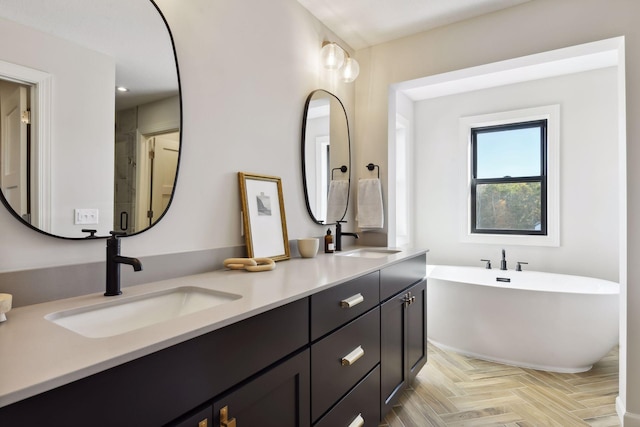 bathroom with vanity, parquet floors, and shower with separate bathtub