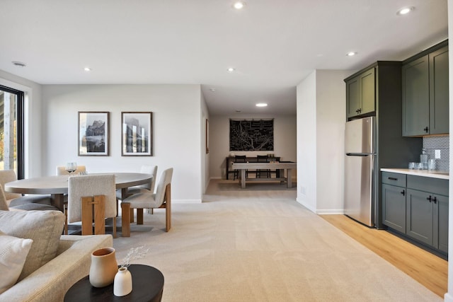 dining area featuring light hardwood / wood-style flooring