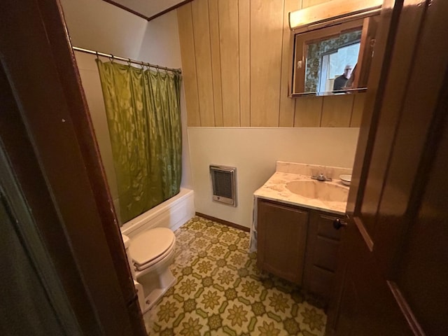 full bathroom featuring vanity, toilet, shower / tub combo, and heating unit