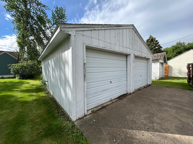 garage with a yard