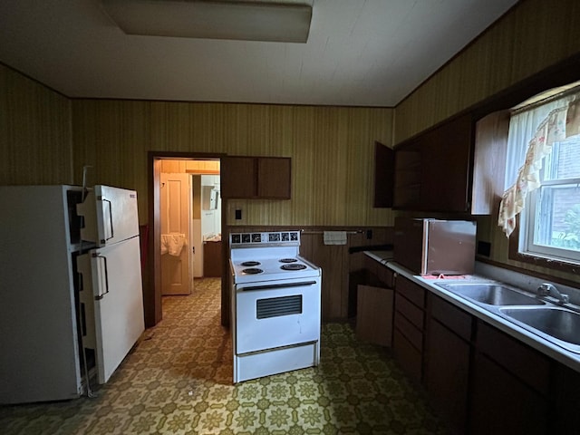 kitchen with white appliances and sink