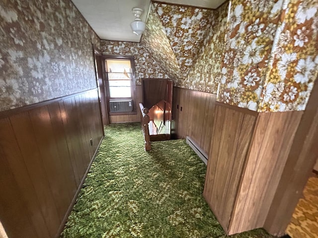 view of horse barn featuring cooling unit and a baseboard radiator