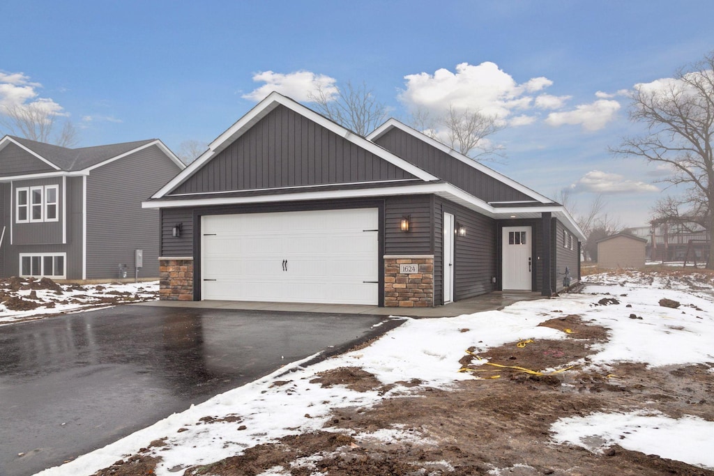 view of front of property with a garage