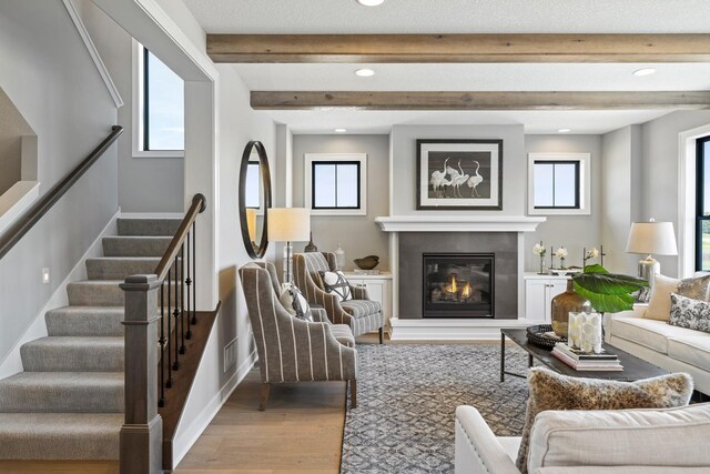 interior space featuring hardwood / wood-style flooring and beam ceiling