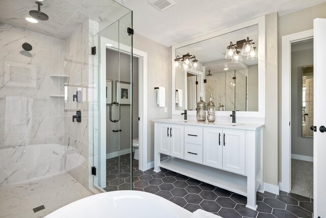 full bathroom with toilet, separate shower and tub, double sink vanity, and tile patterned flooring