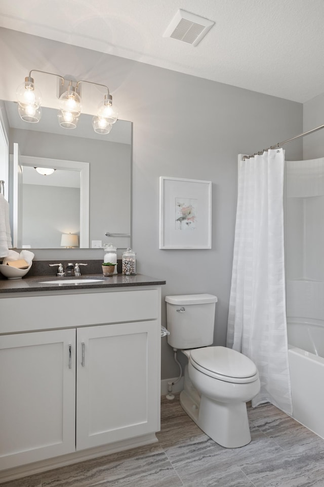 full bathroom with vanity, toilet, and shower / bath combination with curtain