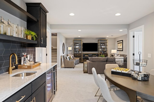 interior space featuring beverage cooler and sink