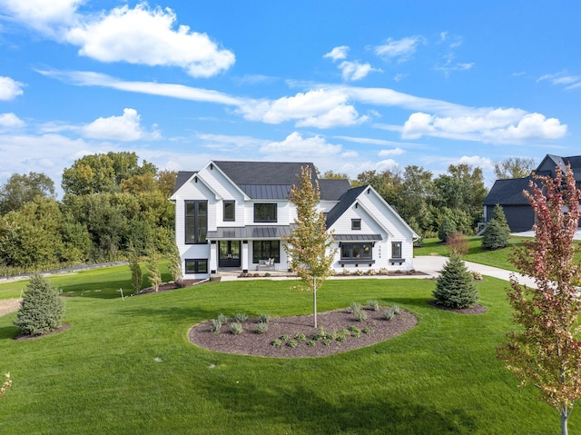 view of front of home with a front yard