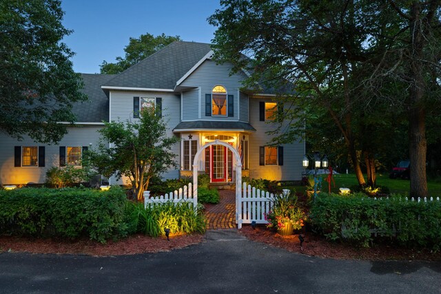 39050 Twin Lakes Rd, Menahga, MN 56464 - view of front of home with fence private yard and a shingled roof