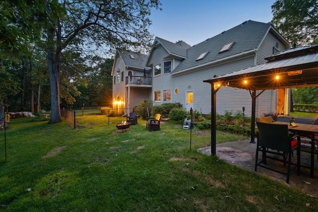 view of yard with a patio area and an outdoor fire pit